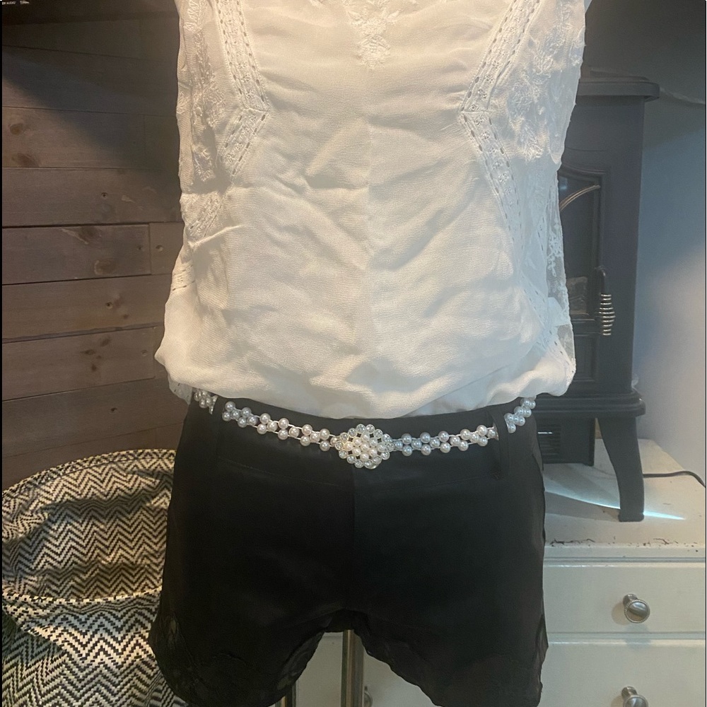 New w/o tag, Gorgeous leather shorts and pretty lace blouse.